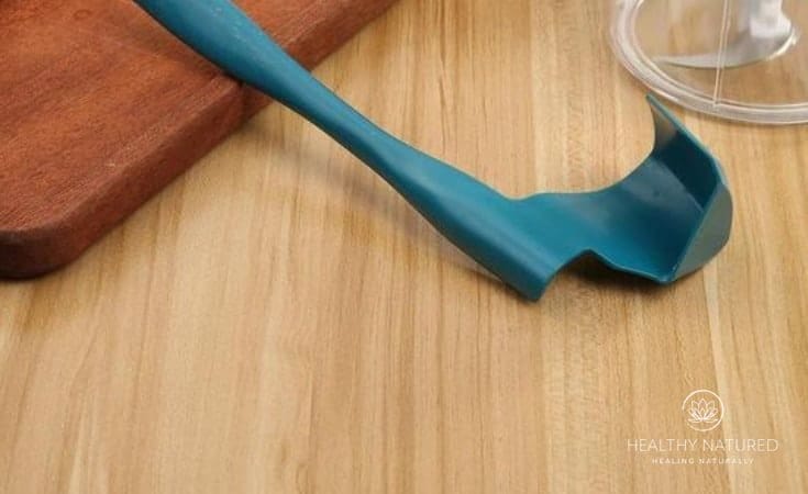Use a spatula to crape the sides of food processor