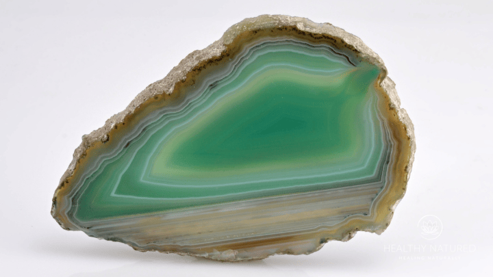 a slice of green agate - healing crystals guide