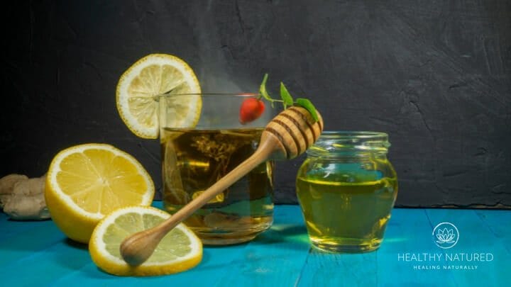 a mug of honey and lemon tea - home remedies for flu symptoms