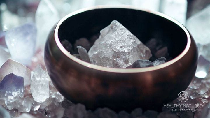 Singing bowls used for sound cleansing - learn how to use sound in our guide to cleansing a crystal