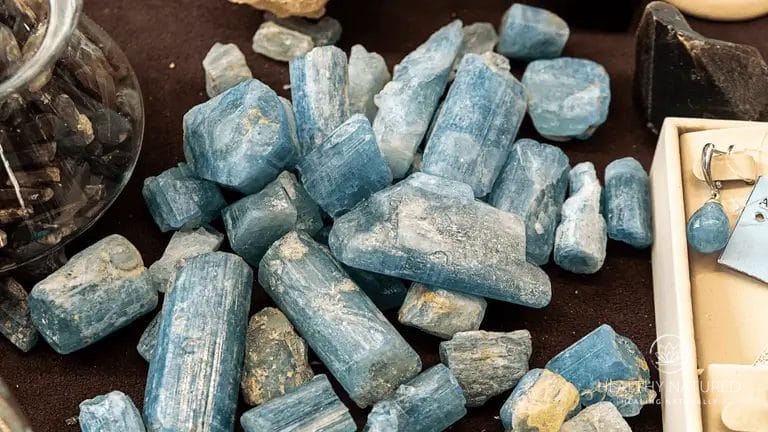 raw or natural state aquamarine stones spot the earring